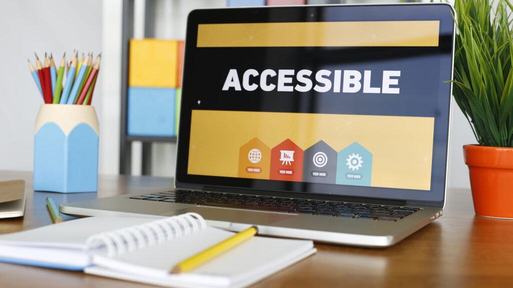 Accessible display on laptop screen with icons on desk
