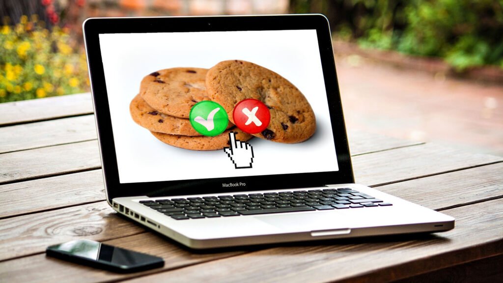 Laptop screen displays virtual cookie acceptance policy options
