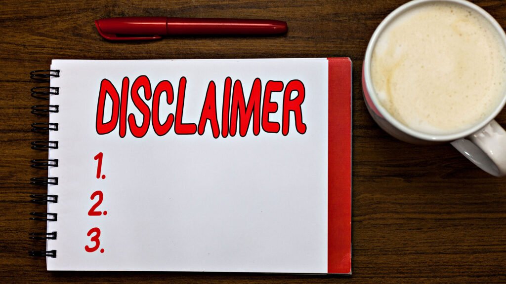 Disclaimer note beside red pen and coffee cup