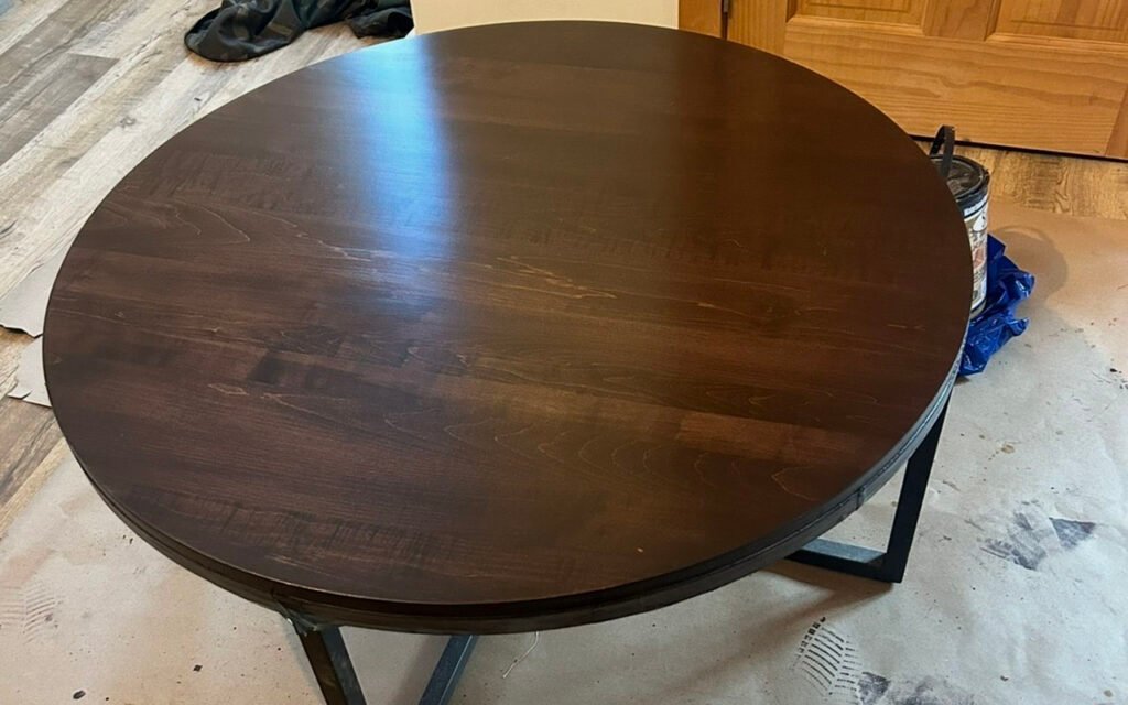 Round wooden table top in a home service setting