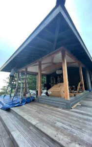 Home renovation project with open porch construction
