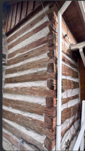 Historic log cabin corner with visible aged timber